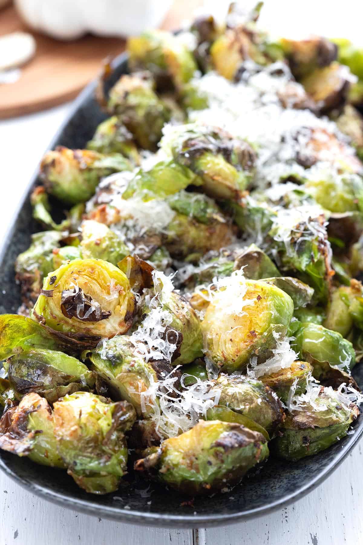 Air Fryer Brussels sprouts in an oval black dish.