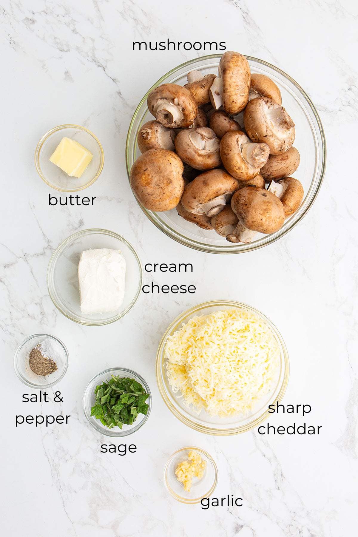 Top down image of ingredients needed for Cheese Stuffed Mushrooms.