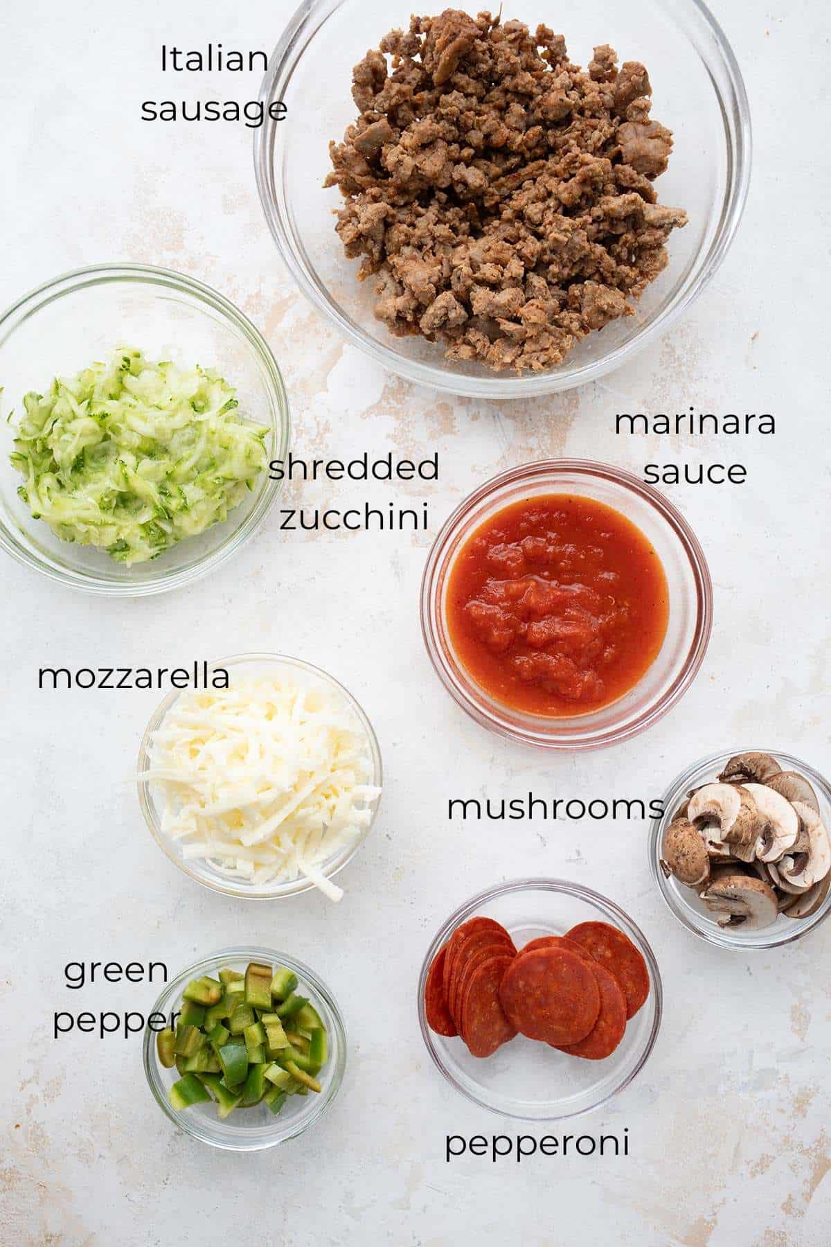 Top down image of ingredients needed for Keto Pizza Casserole.