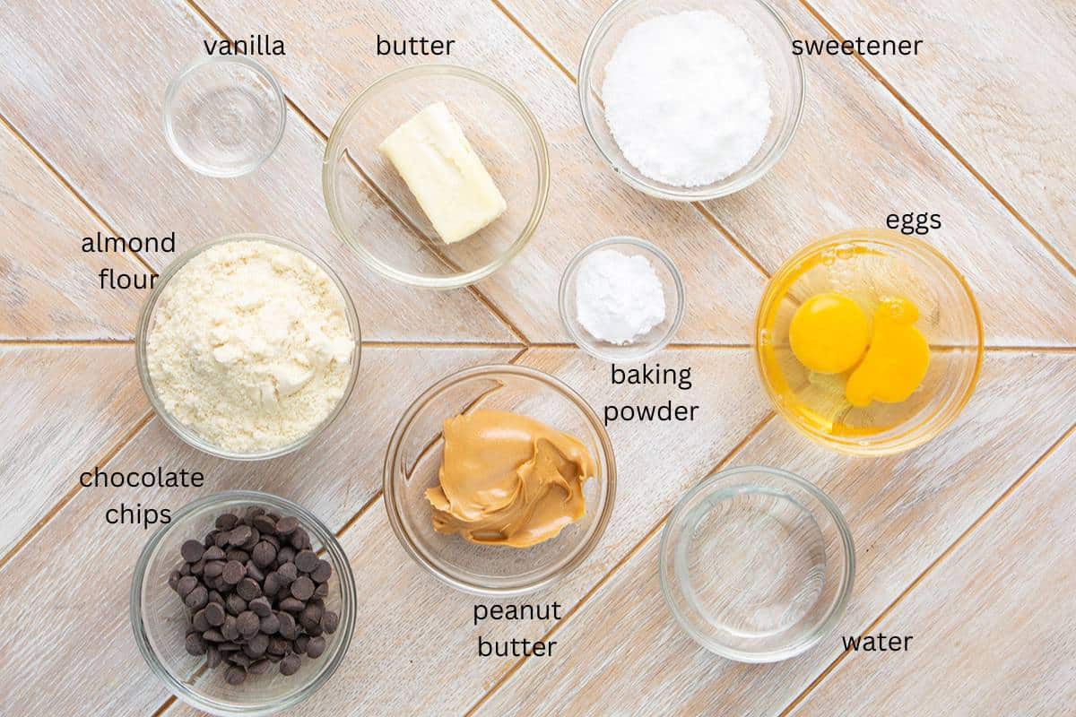 Top down image of ingredients needed for peanut butter keto mug cakes.