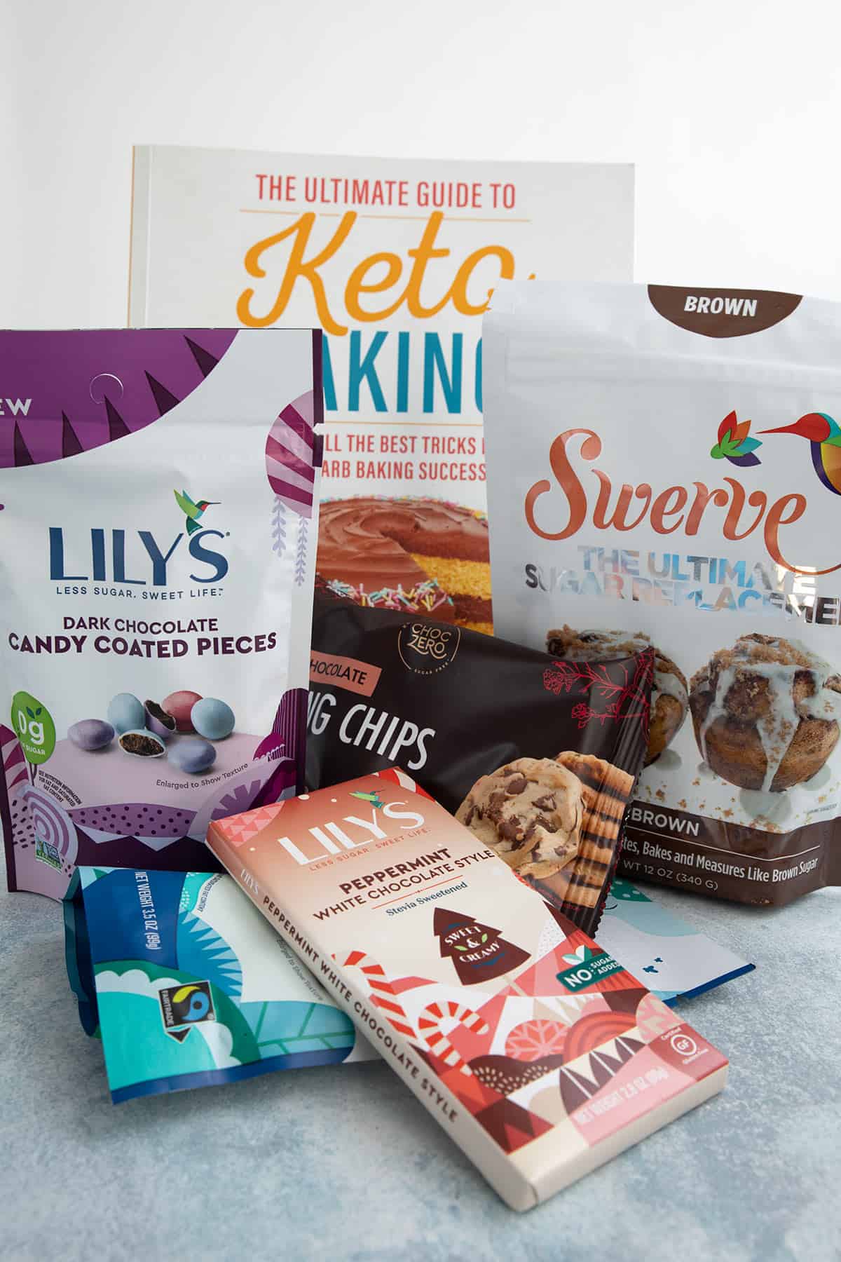 A photo of keto baking book and keto goodies for a giveaway box. 