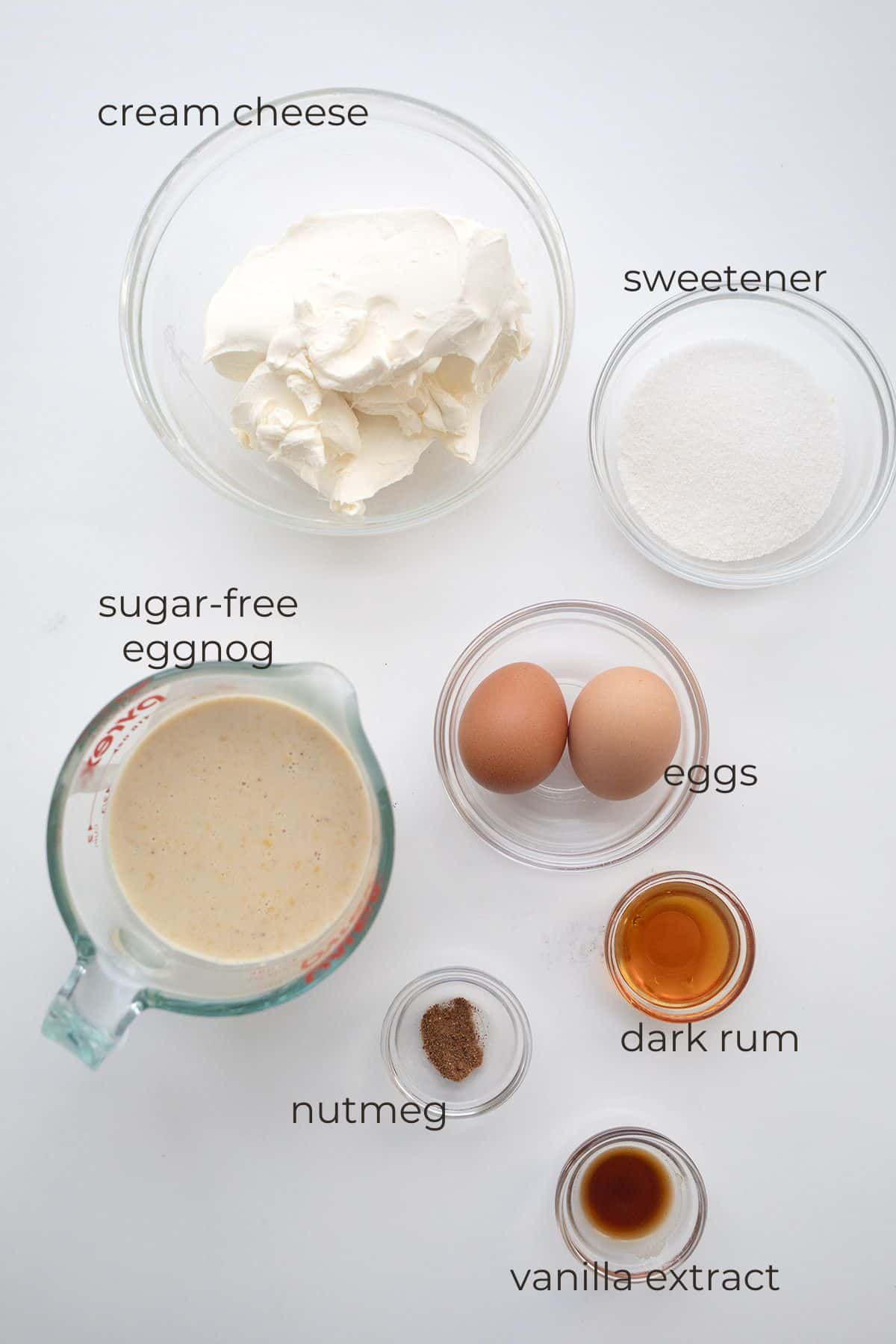 Top down image of ingredients needed for Keto eggnog cheesecake.