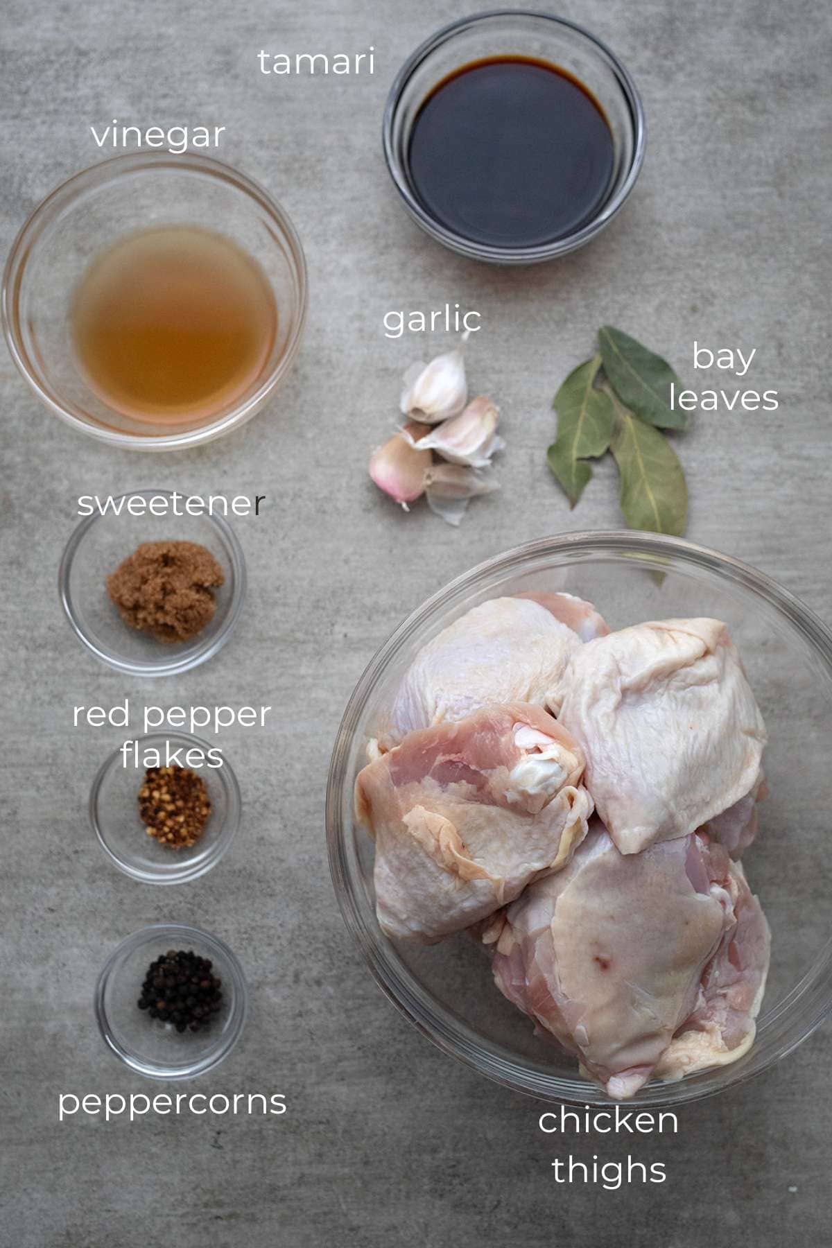 Top down image of ingredients needed for chicken adobo.