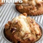 Titled image of cream cheese stuffed Keto Carrot Cake Muffins in a metal muffin pan.