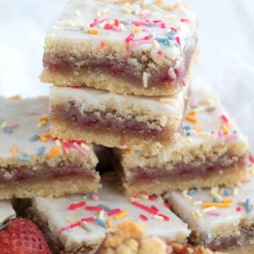 A stack of keto pop tart bars close up on a white wooden table.