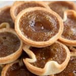 Titled Pinterest image of a plate full of Keto Butter Tarts.