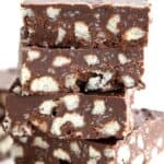 Titled Pinterest image for No Bake Keto Crunch Bars in a stack on a white background.