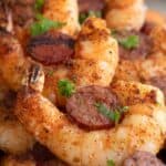 Titled Pinterest image of Shrimp and Sausage Skewers close up.