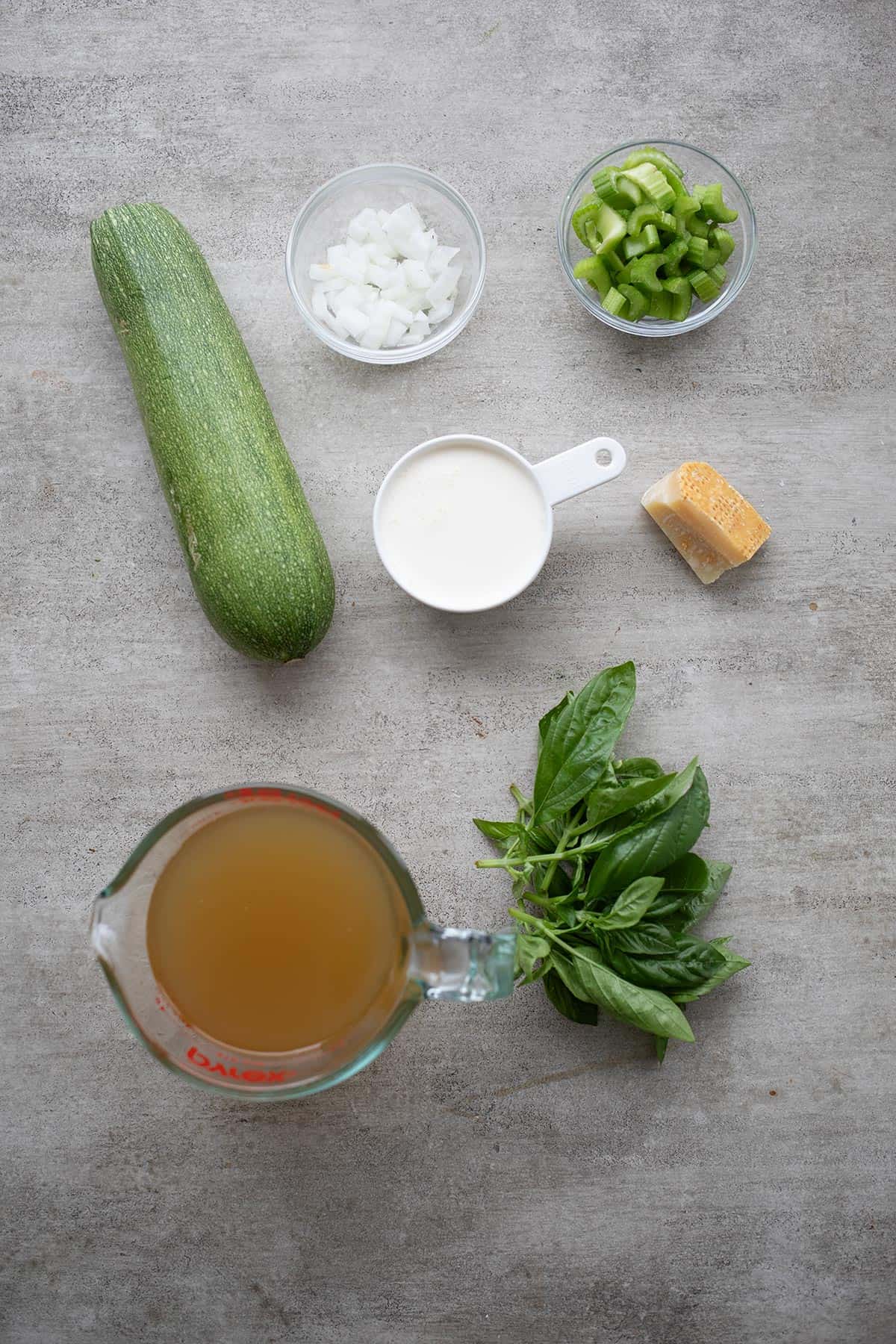 Top down image of ingredients for Keto Zucchini Soup.