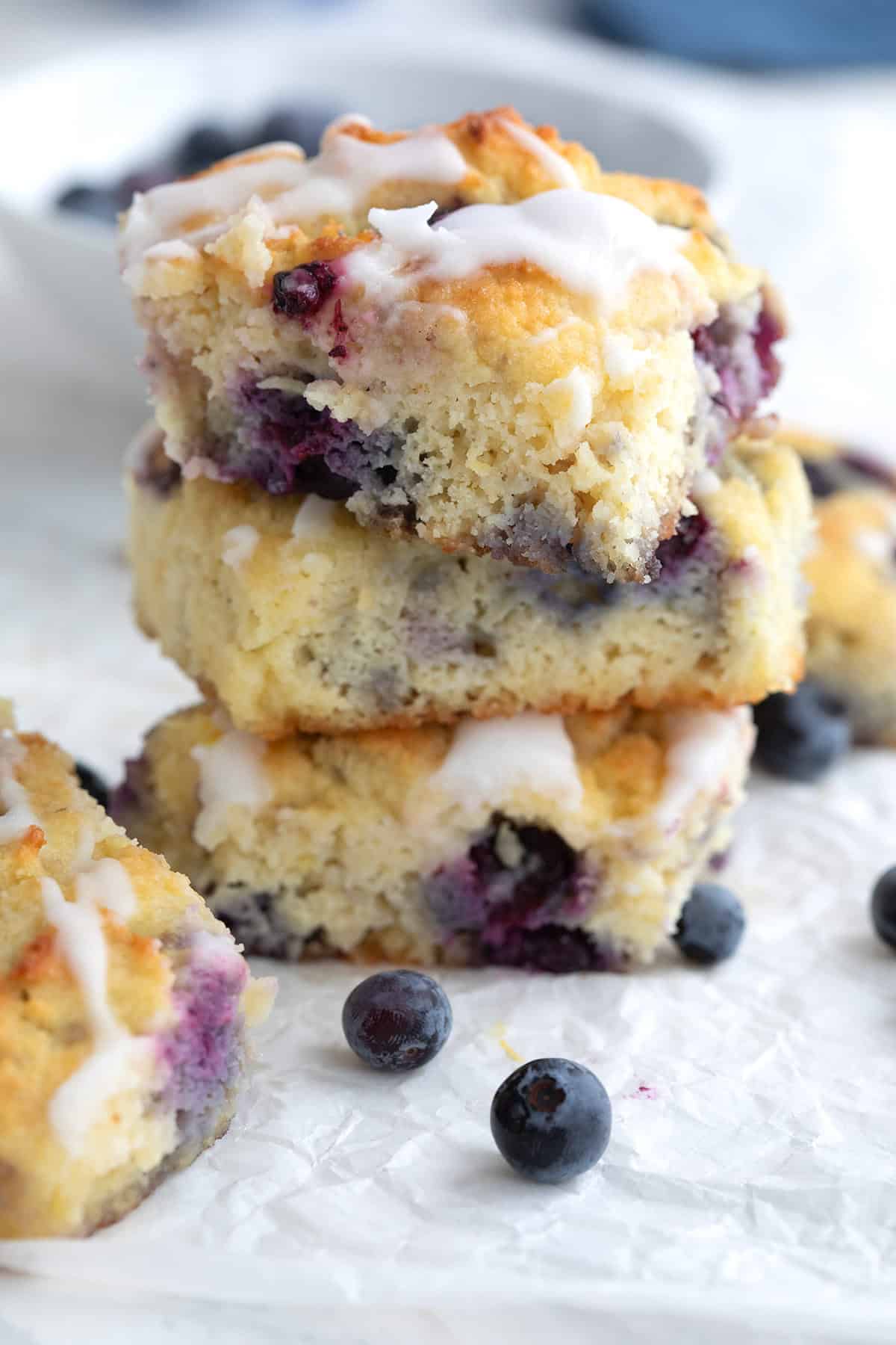 Close up shot of a stack of Keto Blueberry Biscuits.