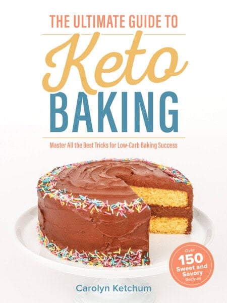 Cover of The Ultimate Guide to Keto Baking. White cover with a yellow cake covered with chocolate frosting on a white cake plate.