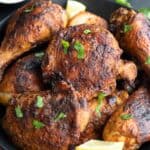 Titled image of a black bowl piled with Air Fryer Tandoori Chicken.