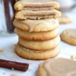 A stack of keto pop tart cookies with the top one cut in half to showing the inside.