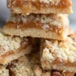 Titled image of a stack of Keto Salted Caramel Butter Bars on a white plate.