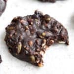 Close up shot of a Keto No Bake Cookies with a bite taken out of it.