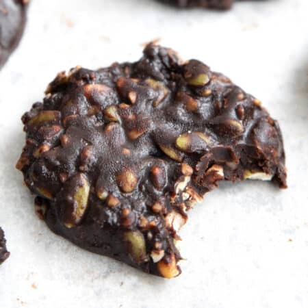 Close up shot of a Keto No Bake Cookies with a bite taken out of it.