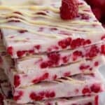 Titled image of a stack of high protein keto frozen yogurt bark squares.