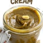 Titled image of Keto Pistachio Cream in a small jar, with pistachios scattered around the bottom.